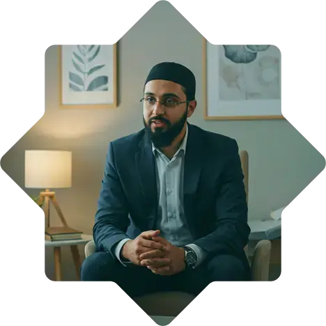 bildet viser en muslimsk terapeut midt i en samtale